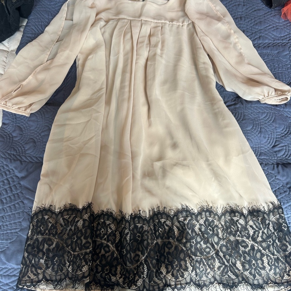 Elegant Cream Dress with Black Lace Trim